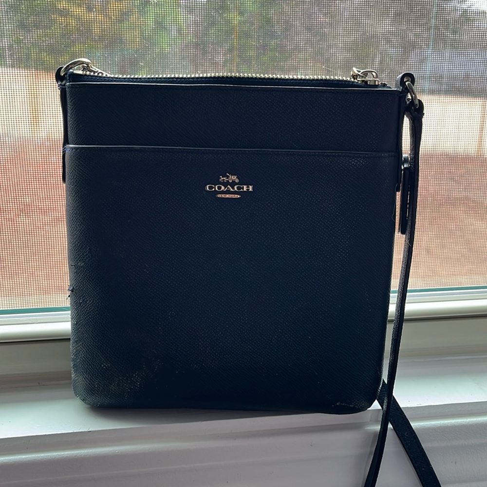 Well-loved Navy Coach Purse